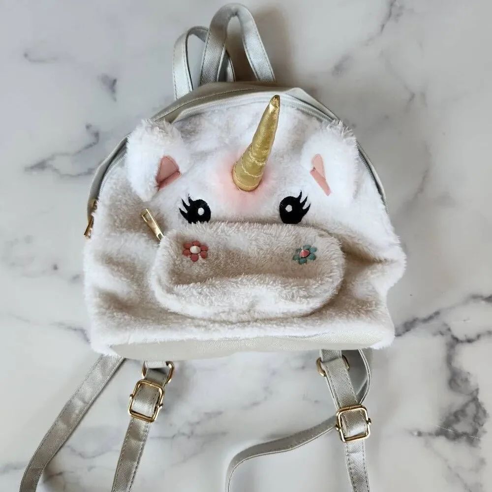 Unicorn plush girls backpackโcreamโ3d